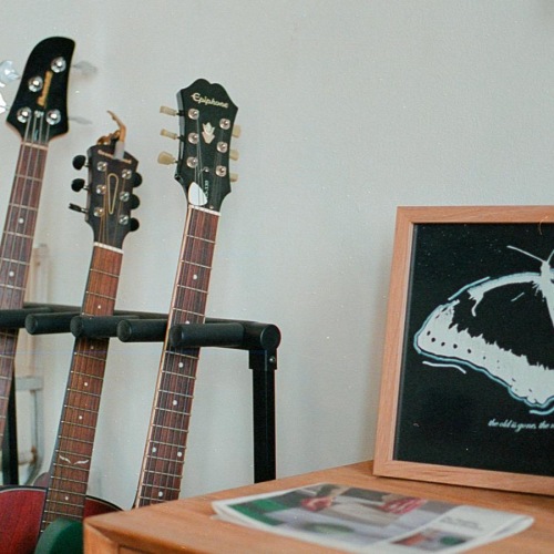 a group of guitars on a table