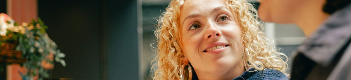 lady with blonde hair smiling